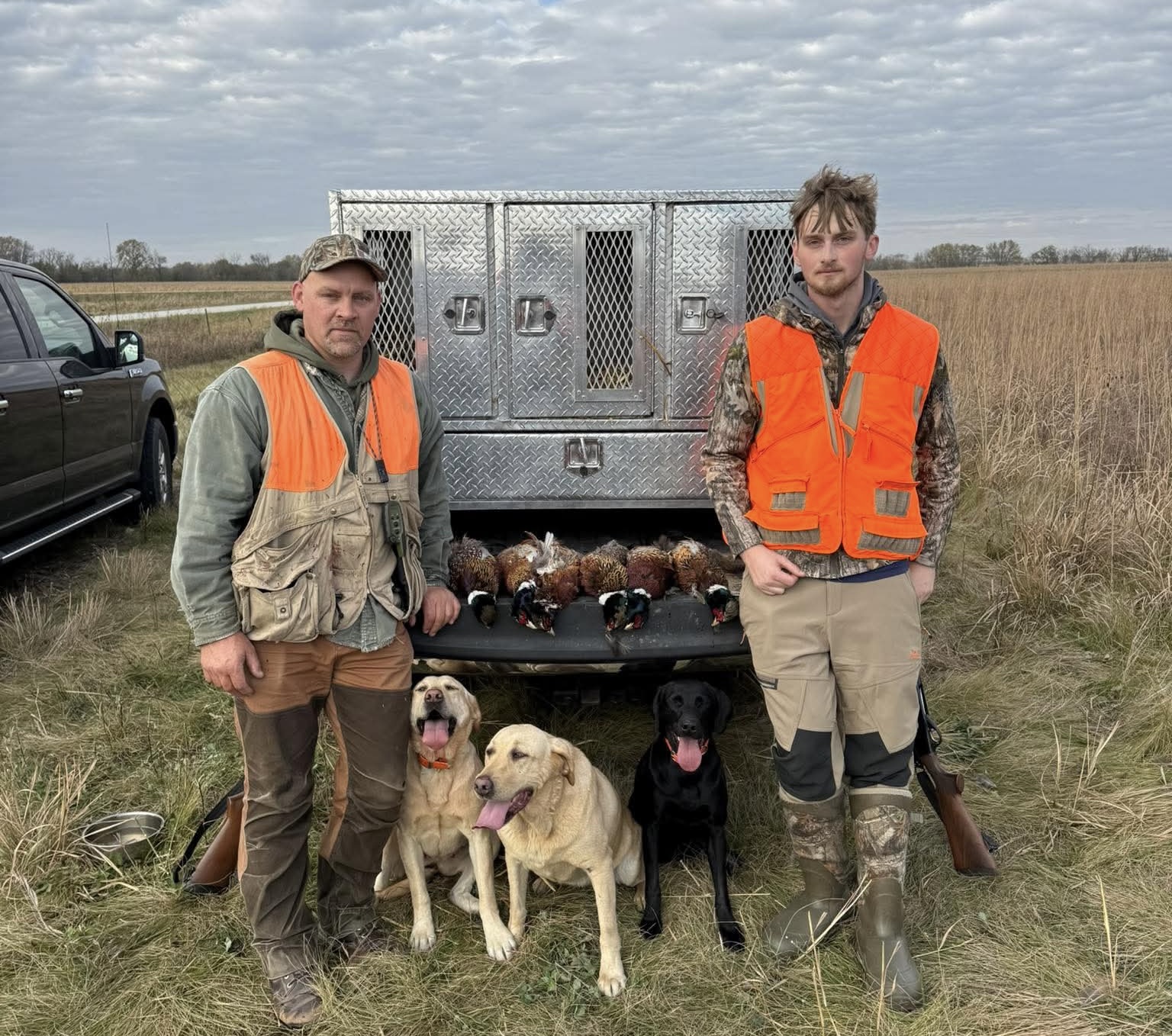 A family with their labrador.